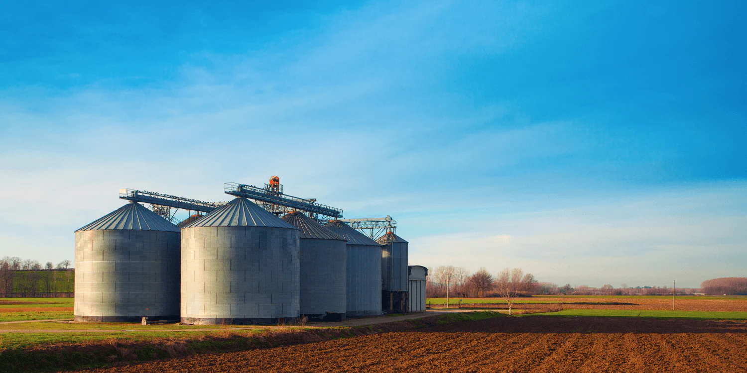 Stock photo (Canva): Grain silos can be compared to data silos, where data sits like grain in its own closed system